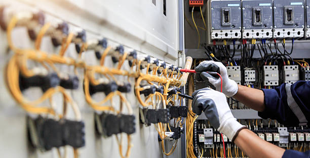 Professional Electrical Panel Upgrade technician working in Green Lake County County, WI